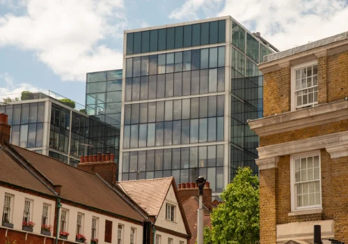 YKS Contractors Limited 22 Homeowner comparing detailed building quotes for a London construction project