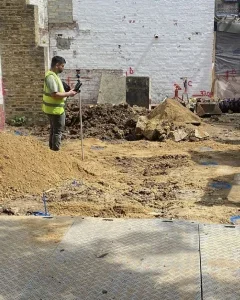 Site manager overseeing residential construction work in London